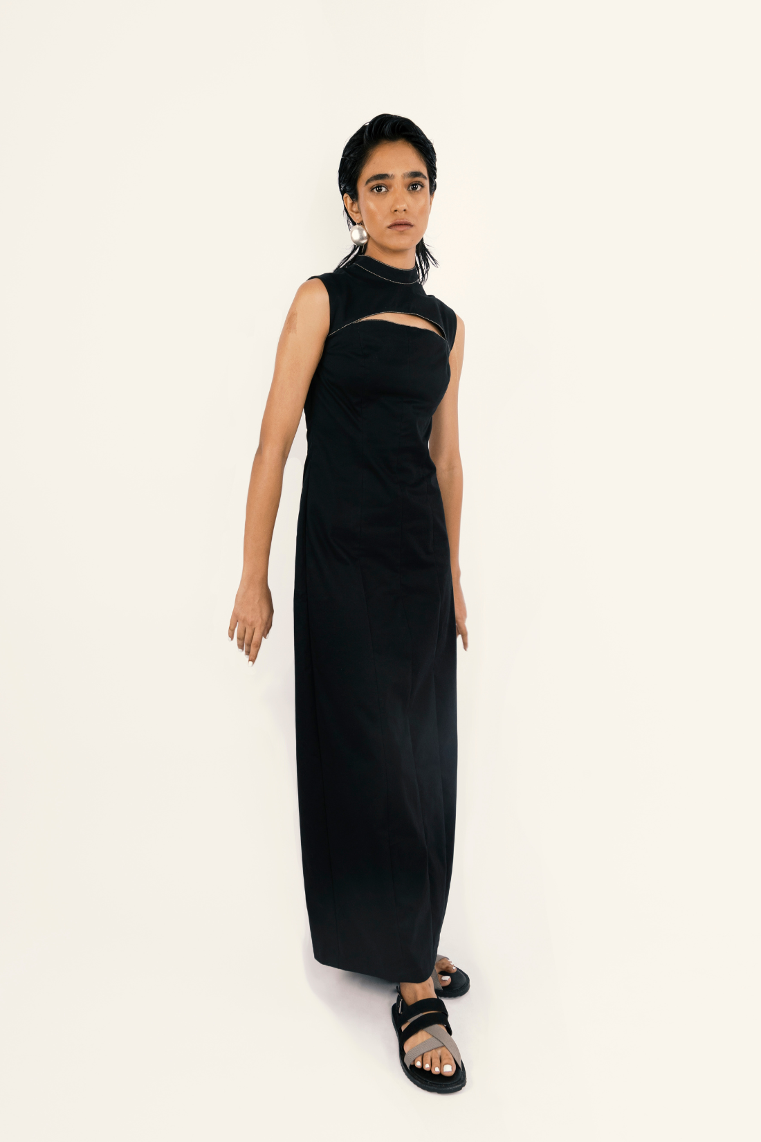 ELONGATING BLACK CUT-OUT DRESS